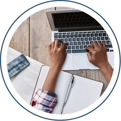 Person typing on a computer representing additional resources